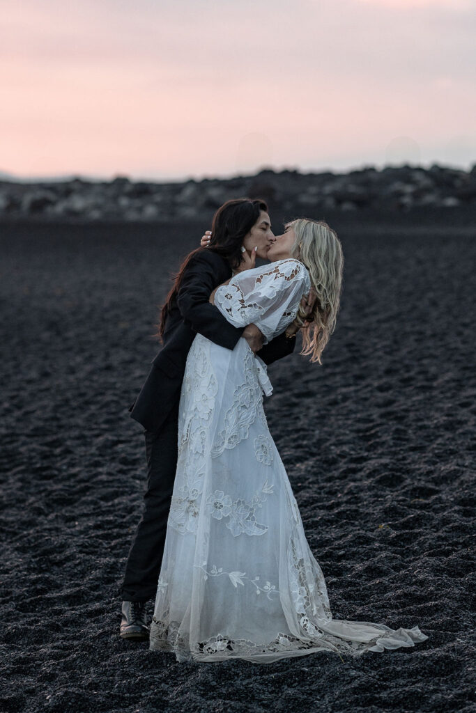 couple kissing during their sunset photoshoot