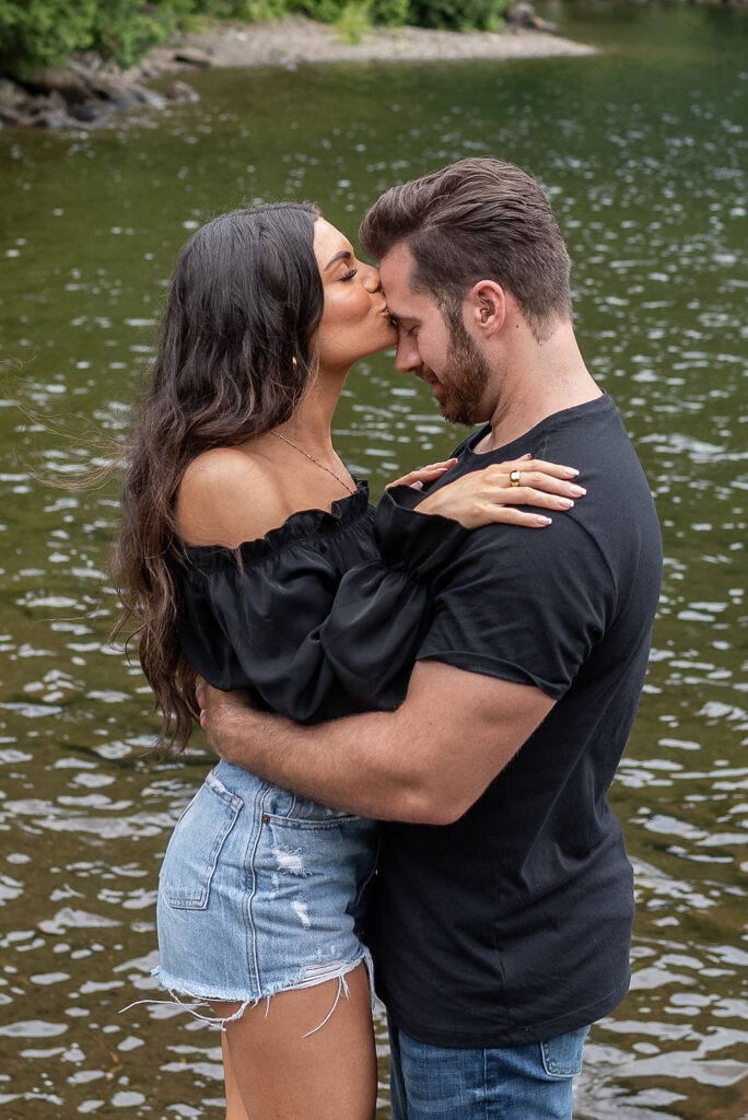 fiance kissing her fiance on the cheek