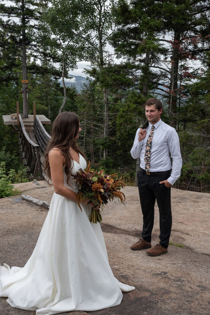 picture of the groom admiring the bride