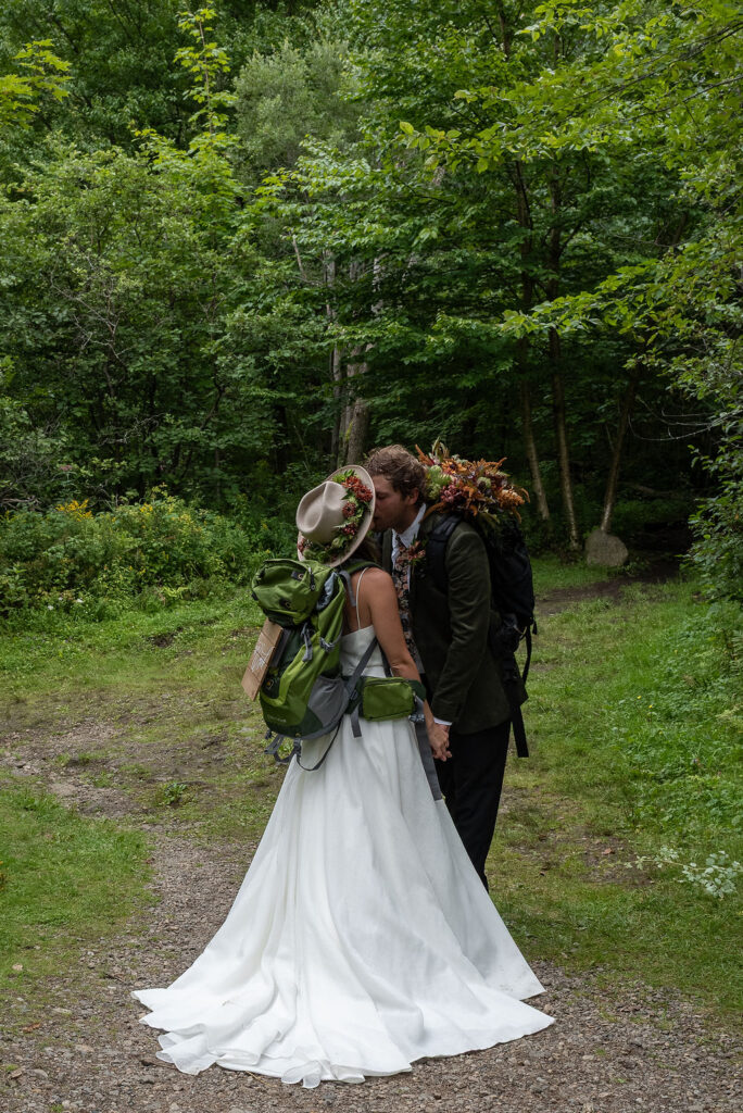 couple kissing during their bridal photos