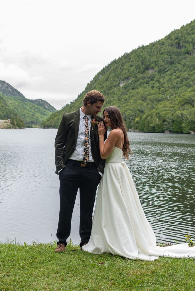 bride kissing the groom on the cheek