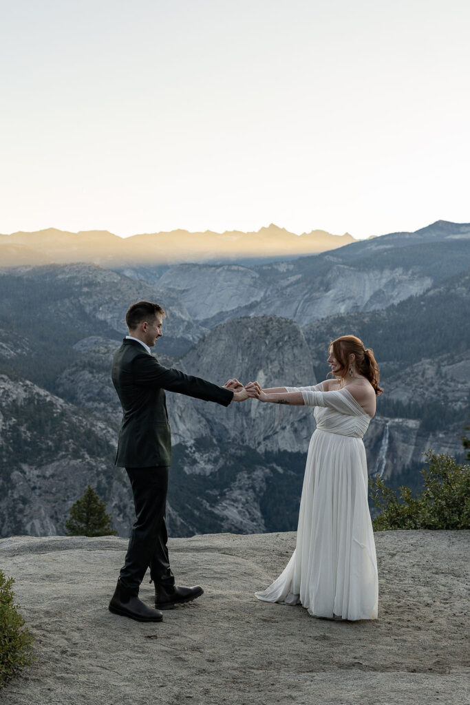 newlyweds dancing during their bridal portraits 
