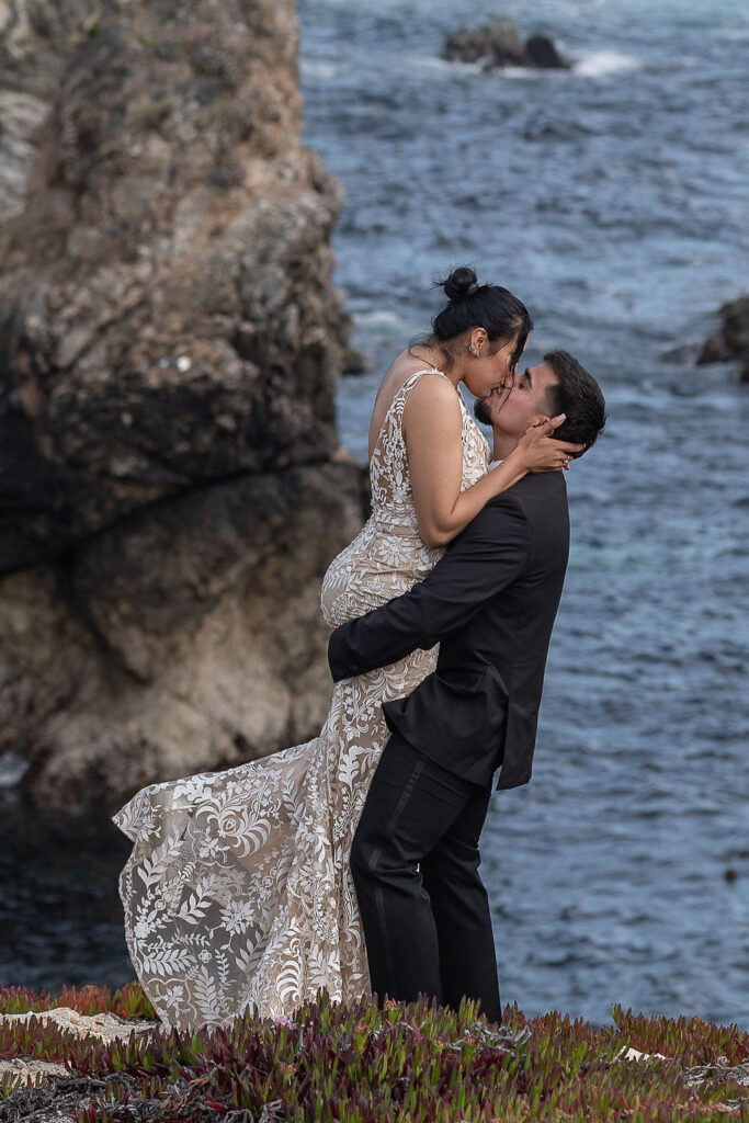 bride and groom kissing during their photoshoot