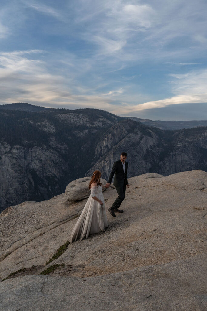 couple holding hands during their bridal portraits 