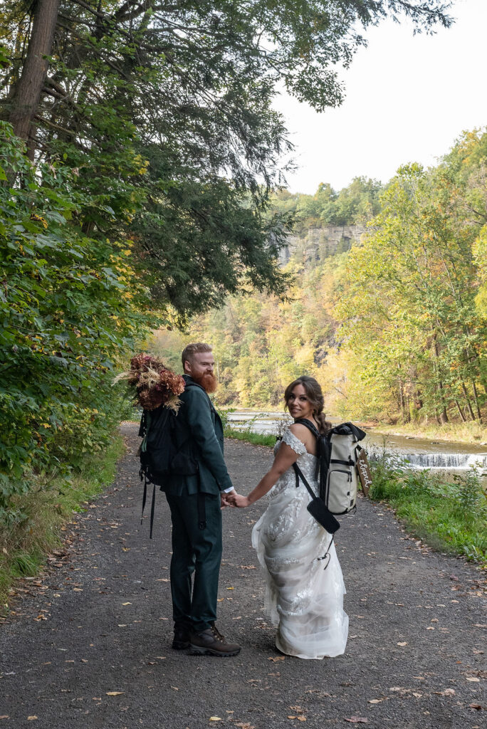 bride and groom holding hands during their bridal portraits 