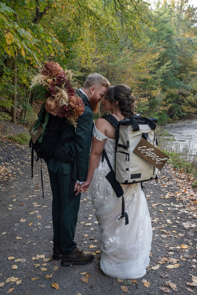 couple smiling at each other during their bridal session