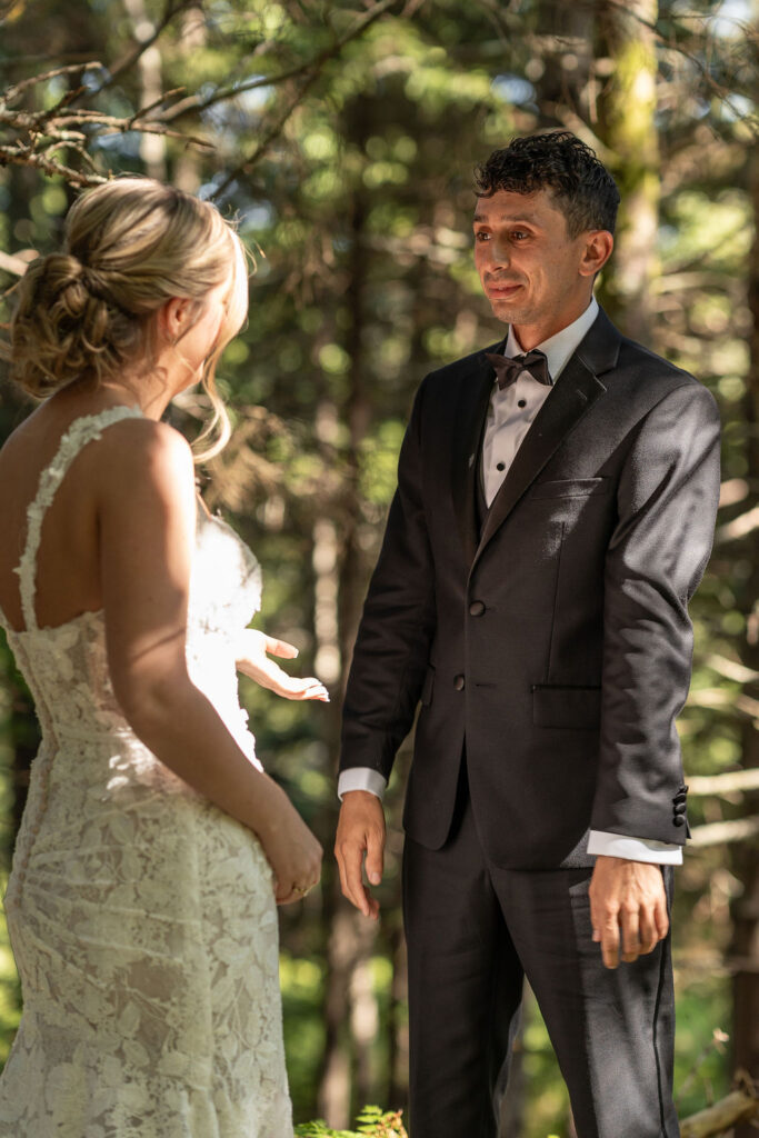 Groom emotional, seeing the bride in her wedding dress