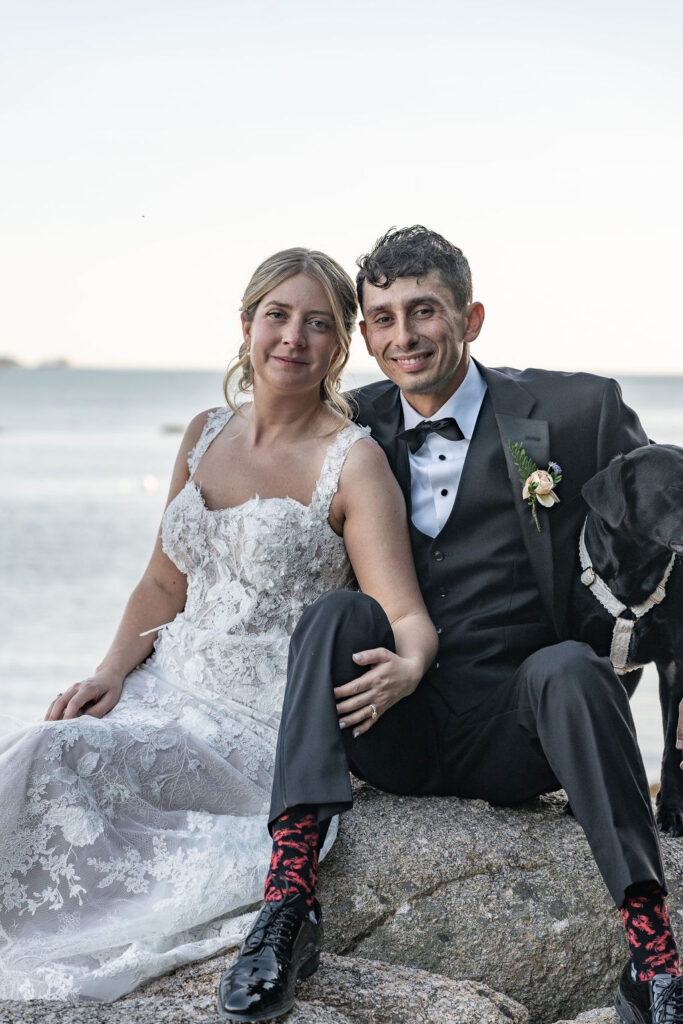 Couple smiling at the camera during their bridal portraits