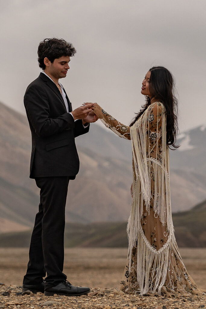 Couple holding hands during their ceremony