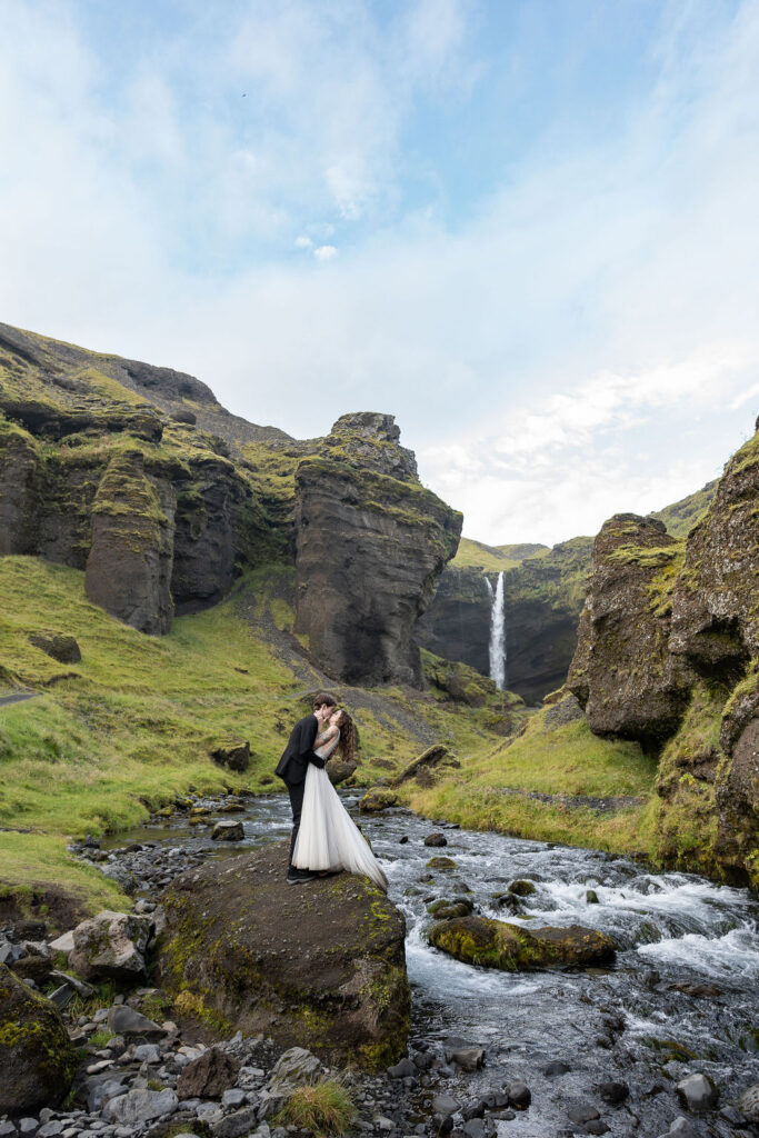 bride and groom kissing after their ceremony
