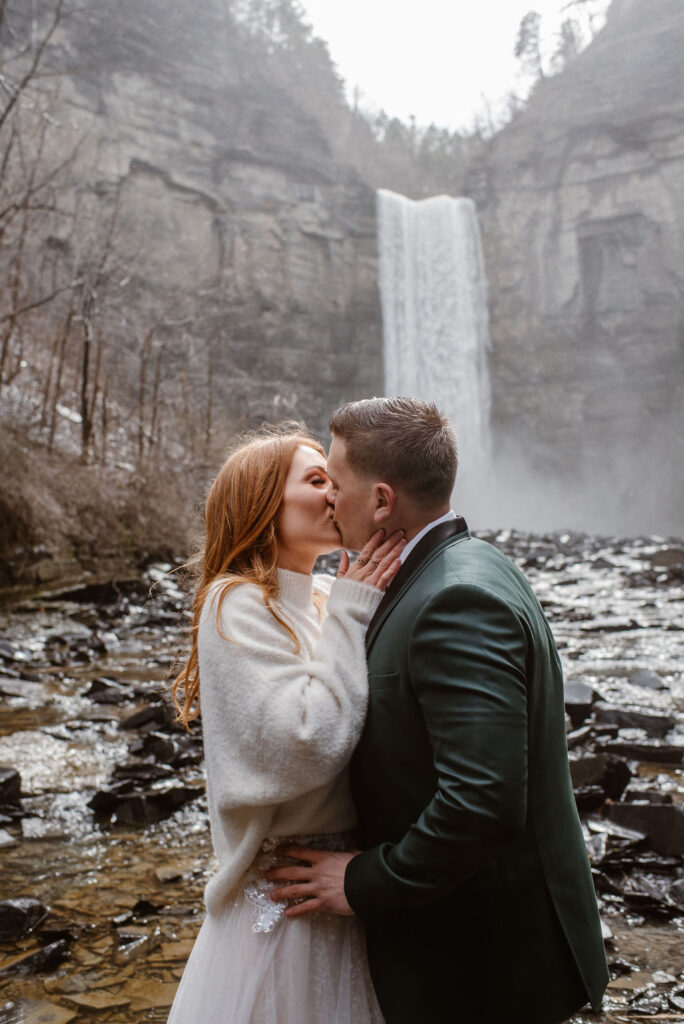 cute picture of the bride and groom kissing