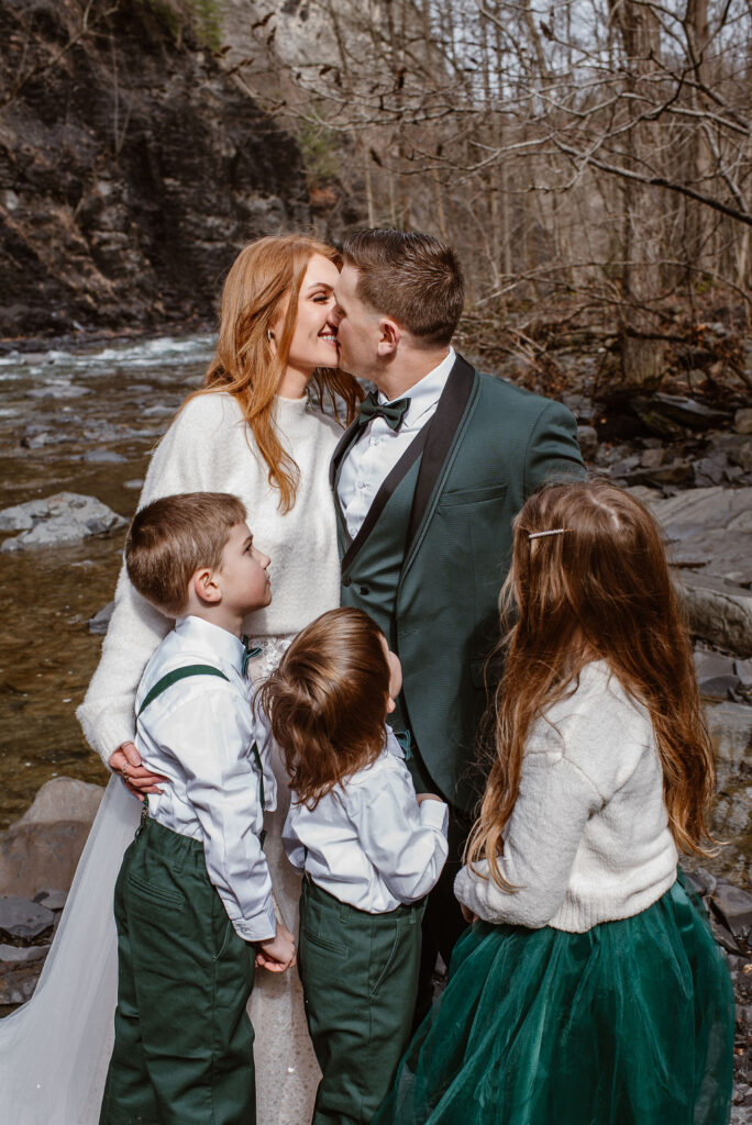 couple kissing during their photoshoot