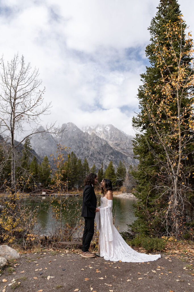beautiful picture of the newlyweds holding hands