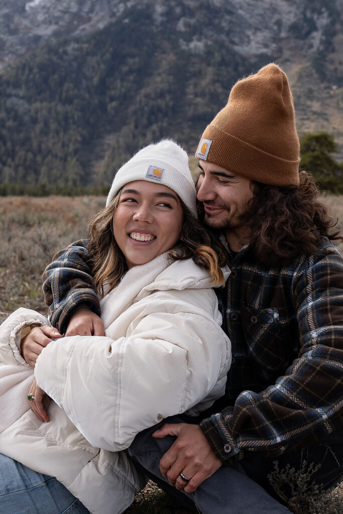 Groom, kissing the bride on the cheek