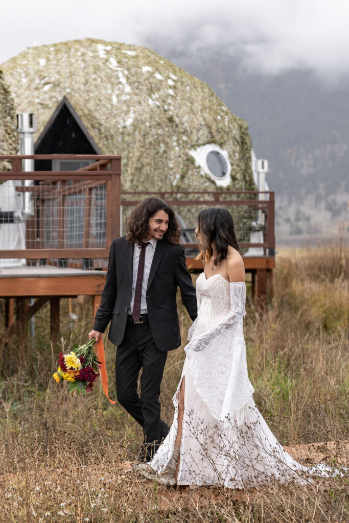 cute picture of the newlyweds holding hands