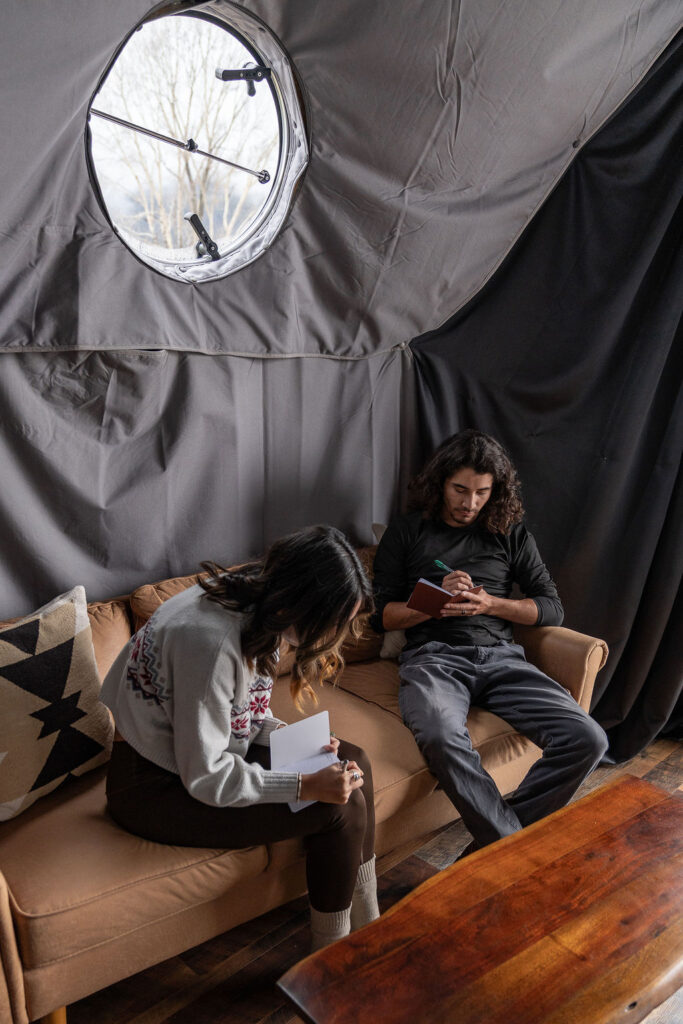 Bride and groom, writing their wedding vows