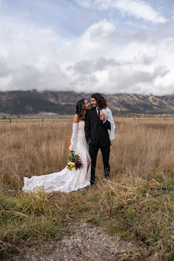 Cute picture of the newly married couple hugging