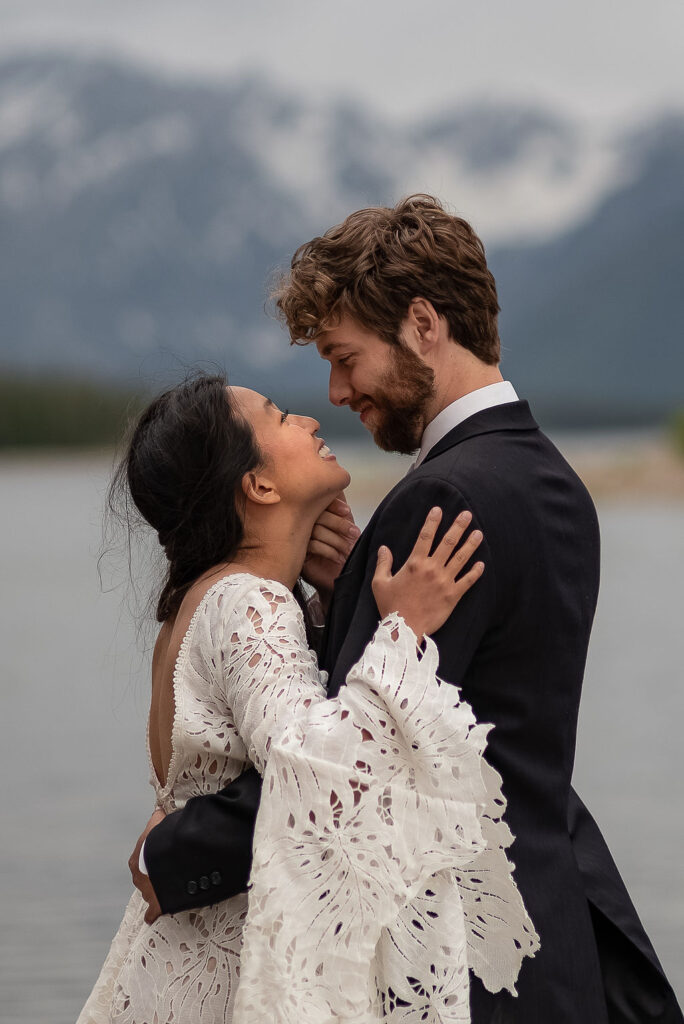 cute picture of the bride and groom smiling at each other