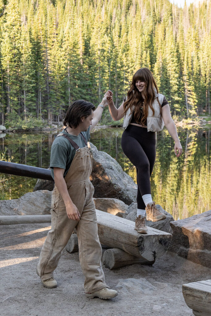 Picture of the newly engaged couple holding hands