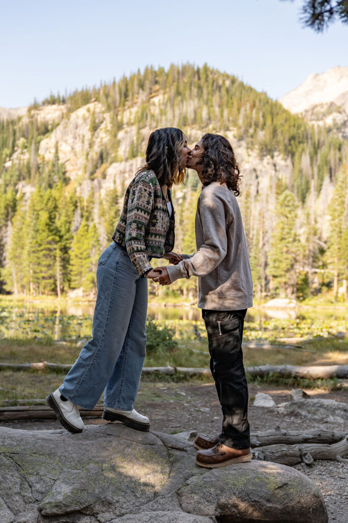 cute picture of the couple kissing during their photoshoot