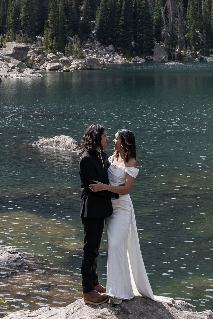 Picture of the bride and groom, smiling at each other