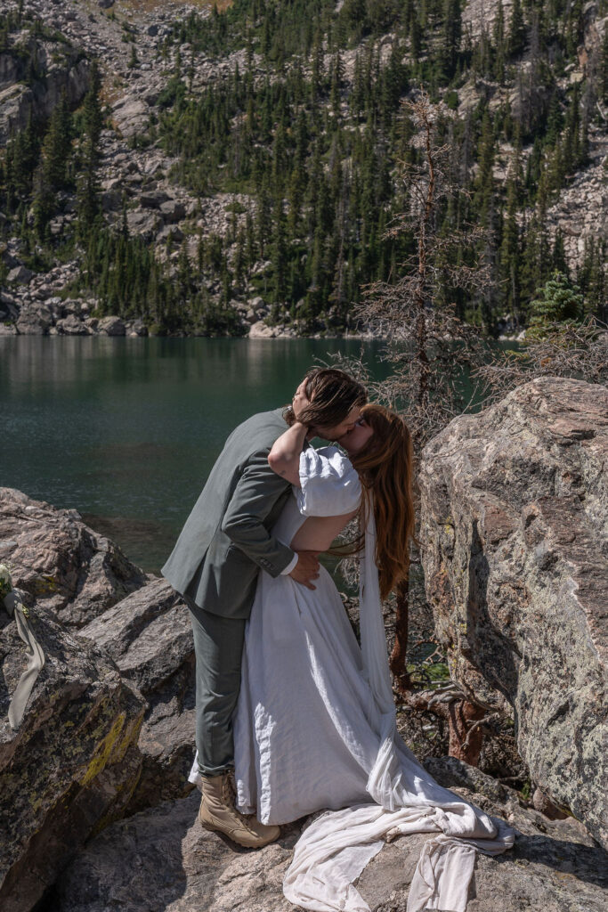 Portrait of the newlyweds kissing